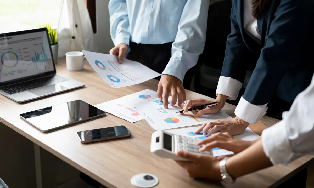 Asian-business-adviser-meeting-to-analyze-and-disc-2023-11-27-05-31-22-utc