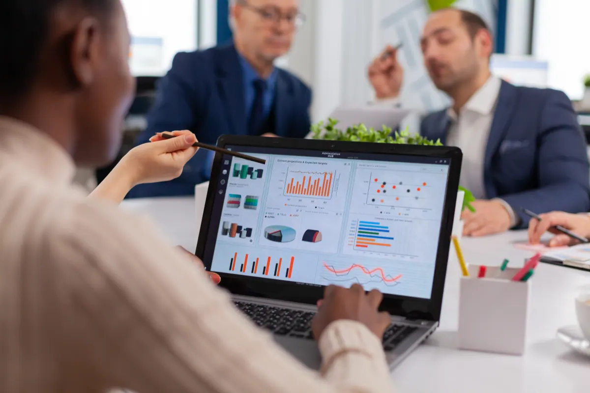 Multi-ethnic-business-team-sitting-at-table-in-off-2023-11-27-04-55-55-utc