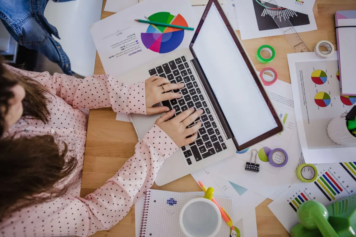 Unrecognizable-woman-typing-laptop-office