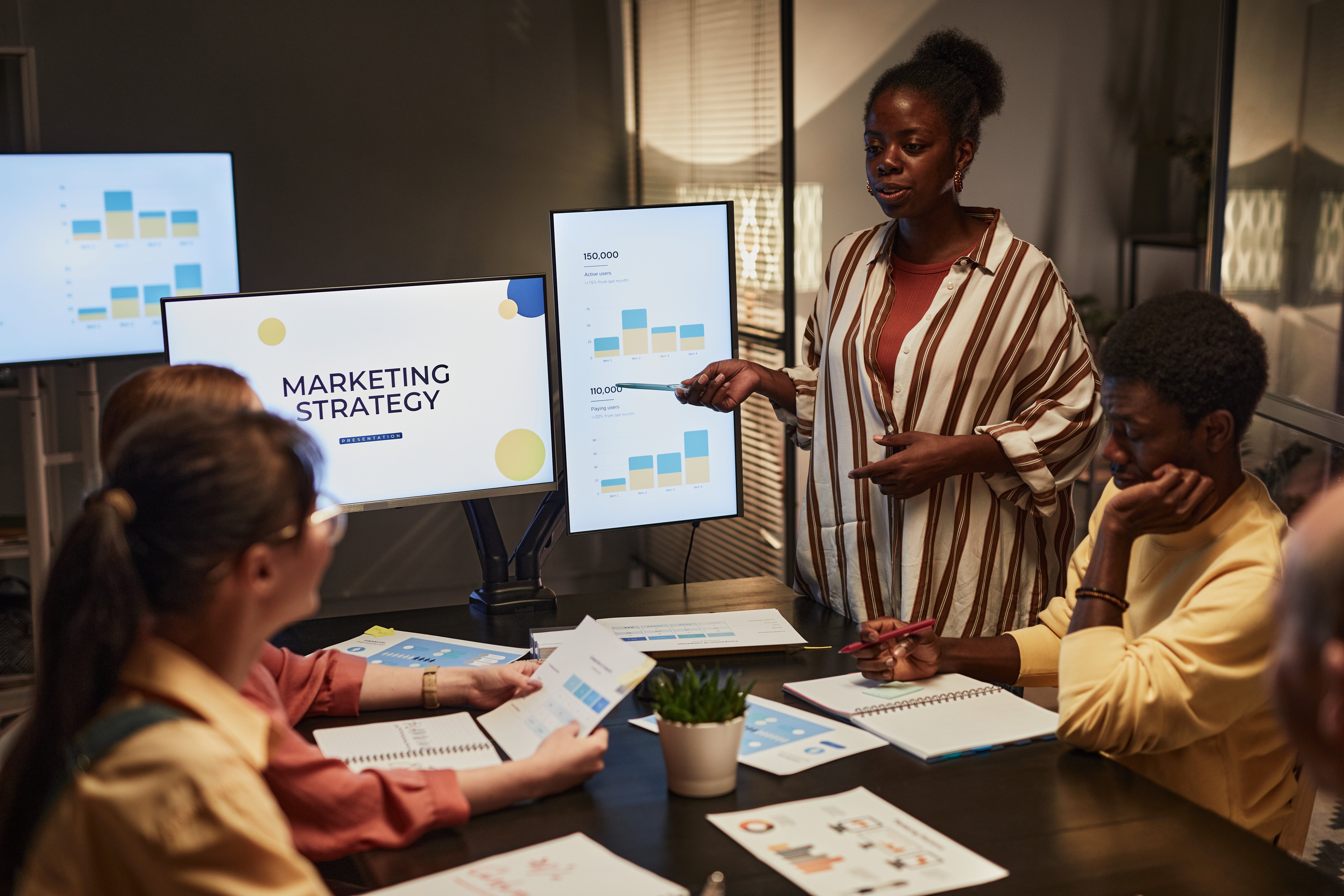 black-woman-presenting-plan-at-meeting-2023-11-27-05-11-32-utc