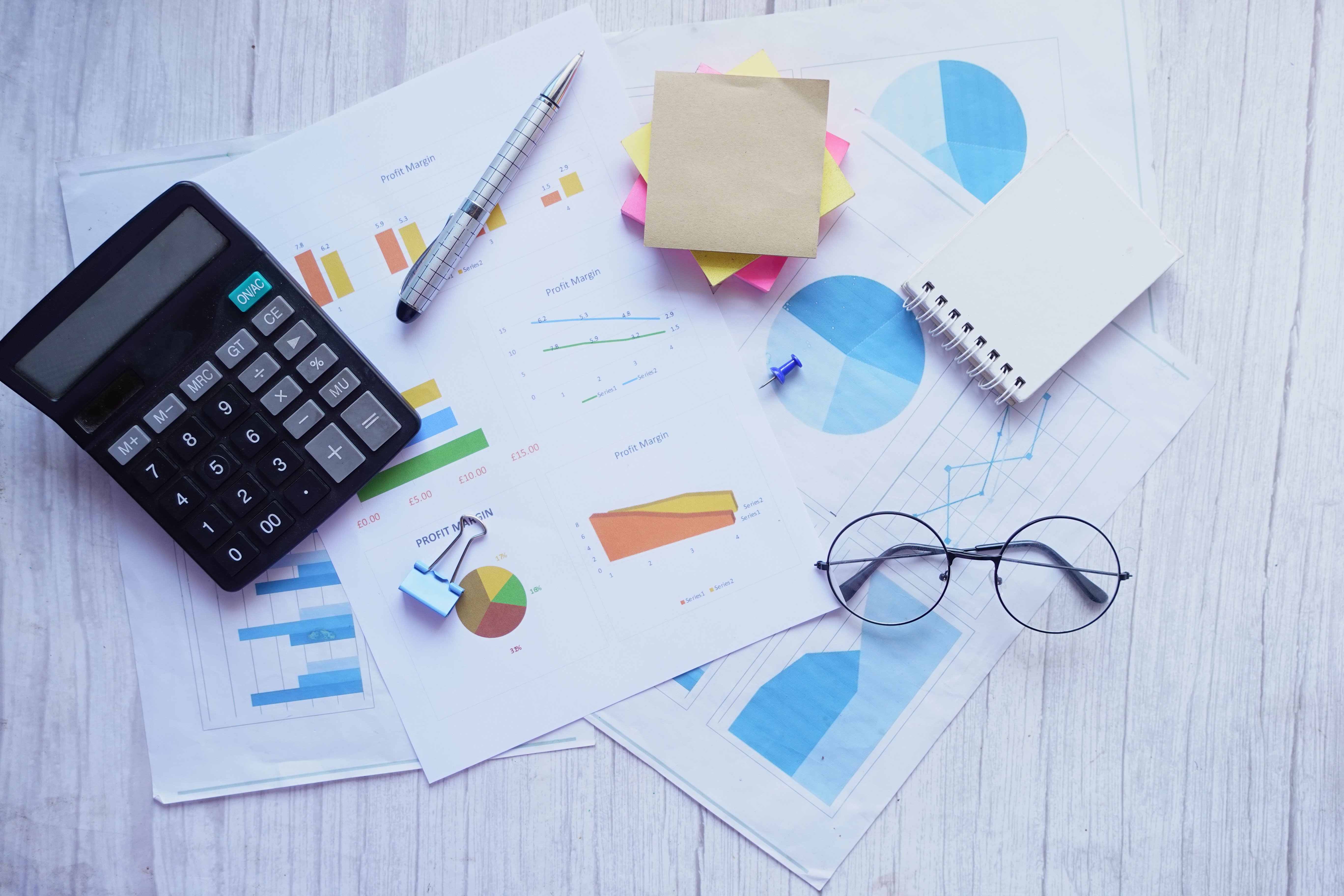 top-view-of-financial-graph-calculator-and-notepa-2024-12-13-10-59-20-utc